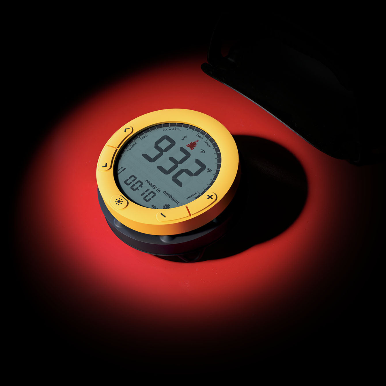 Giant grill gauge under a spotlight